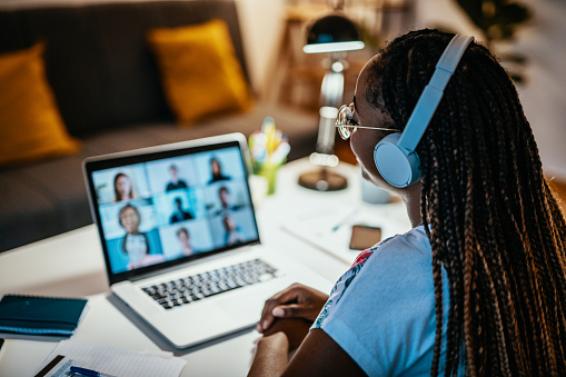 African American female student studying from home during lockdown